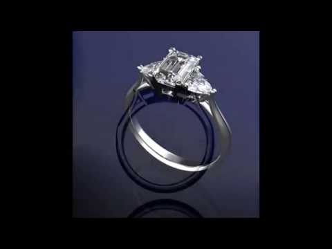 Simpson & Taylor.com presents a Platinum Emerald cut design with trilliant cut side diamonds.