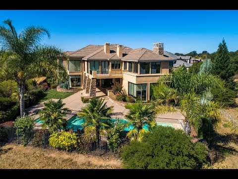 Private, entertainer's dream home in gated Morgan Creek!