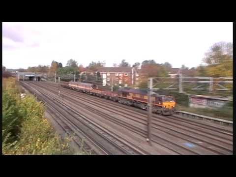 DBS/EWS 66181 Hauls some barrier coaches and wagons past South Kenton 06/11/2010