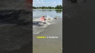 Fisherman Jumps In to Stop a Crocodile