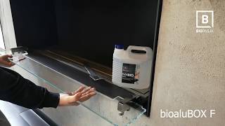 Biokominek wkład z szybą ekranową na uchwytach łamanych