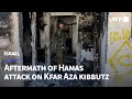 Israel's Kfar Aza kibbutz left in ruins after deadly Hamas attack | AFP