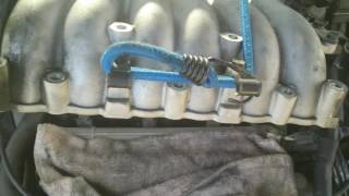 2003 kia optima 2.7 L spark plug change