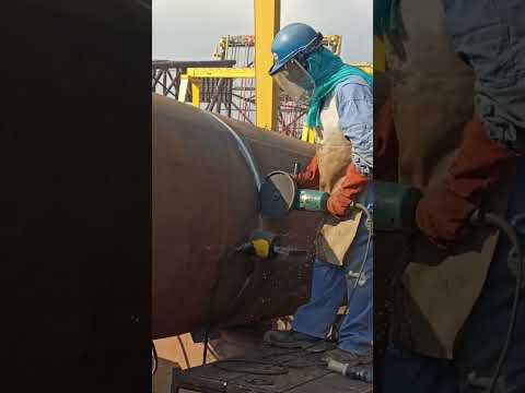 Indian grinder hard working in construction