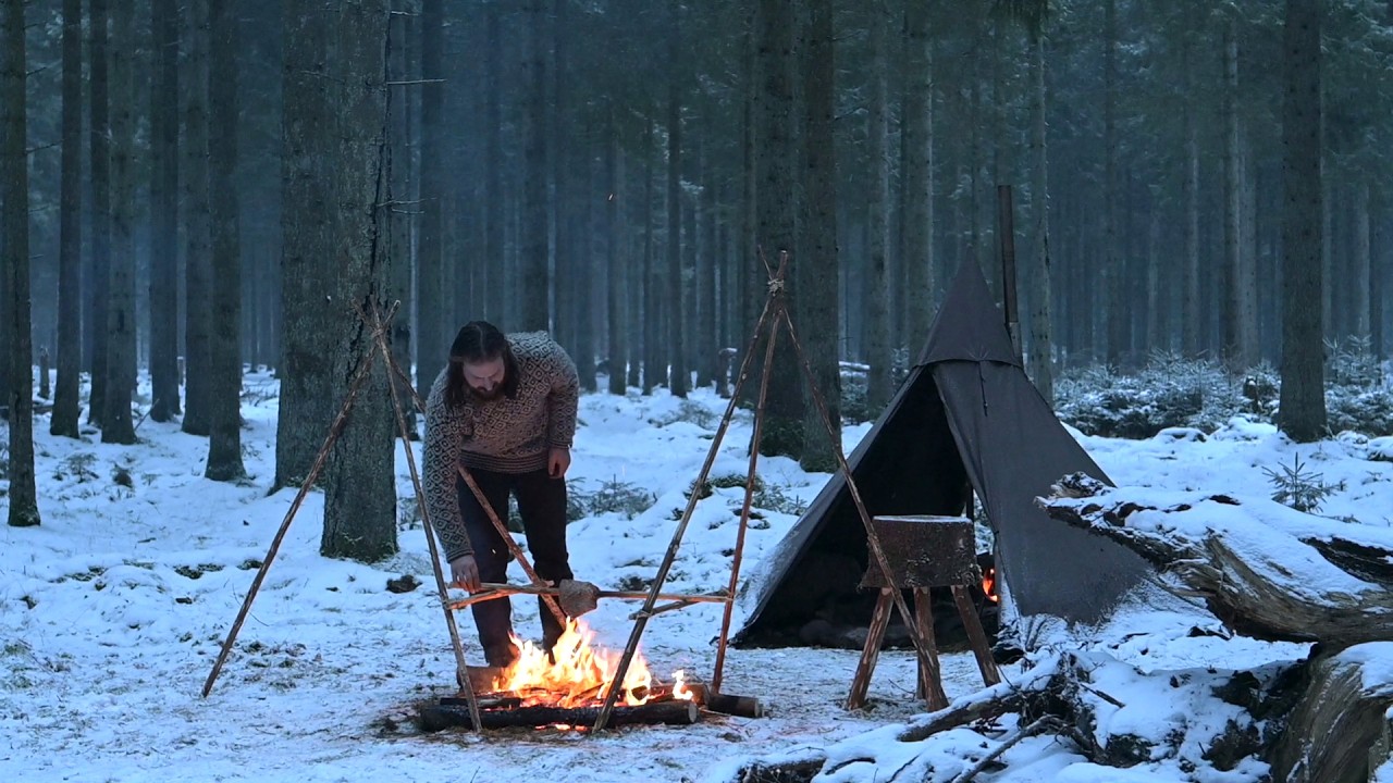 Winter bushcraft trip - canvas hot tent, cooking steak, reindeer skin, homemade axe and knife etc.