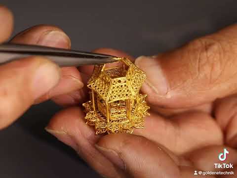 Traditionelle chinesische Filigran- und Einlegetechnik