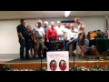 The Guys singing Santa Claus is coming to town ...