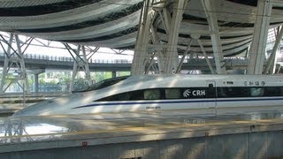 Video : China : Rail link begins with world's fastest train (~400 km/hr)