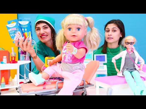 Bebek bakma oyunları. Ayşe, Gül'ü hemşire Ümit'e getiriyor. Doktorculuk oyunu