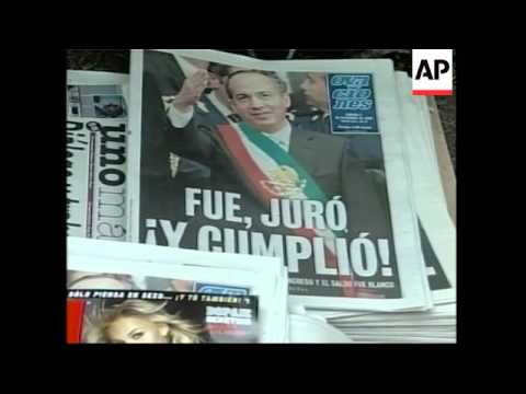 Calderon meets military, calm returns to capital after inauguration