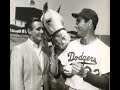 Sandy Koufax pitches to Mr. ED