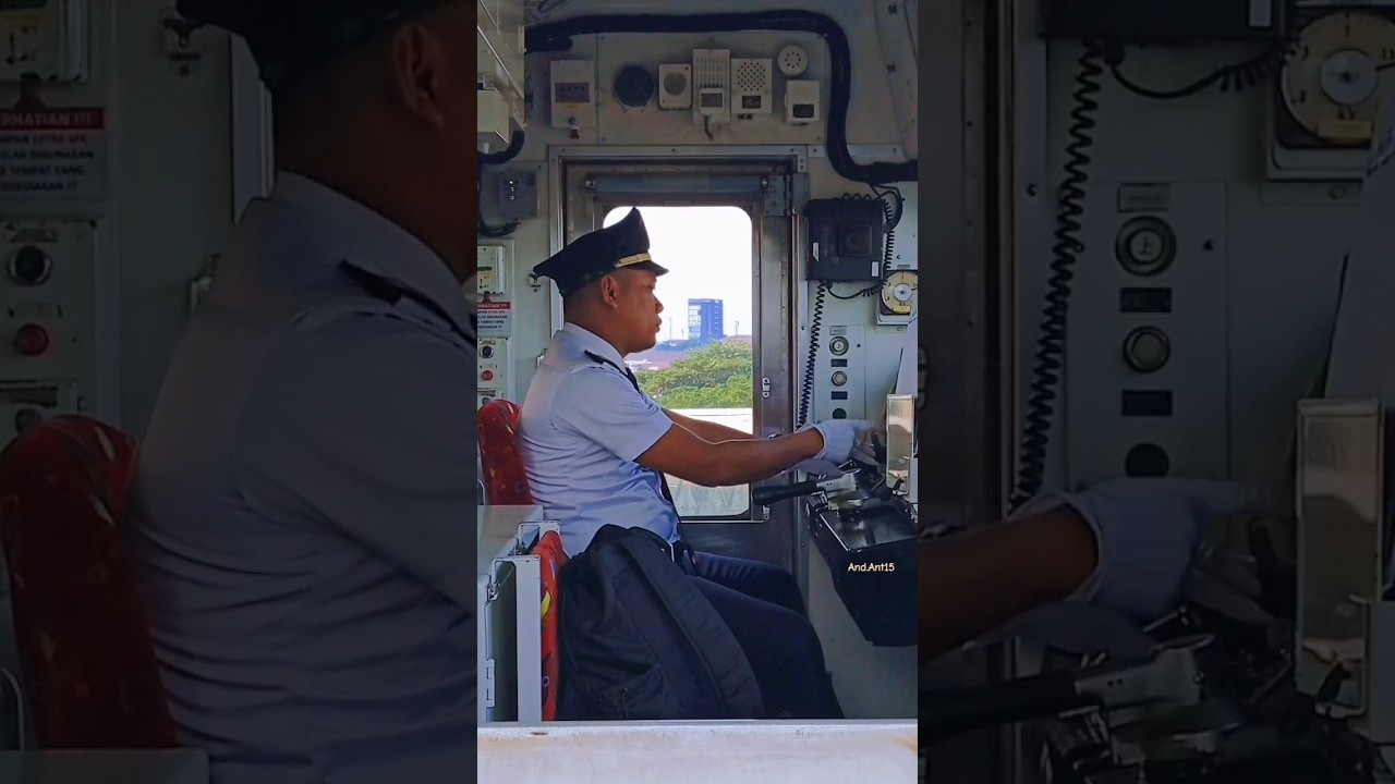 The train driver points and calls when the train is about to depart from Manggarai Station #train...