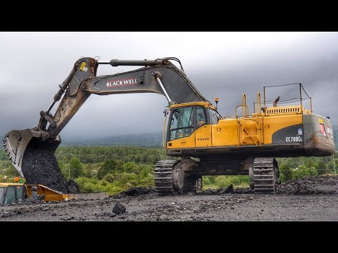 Volvo EC700C Excavator Loading Trucks