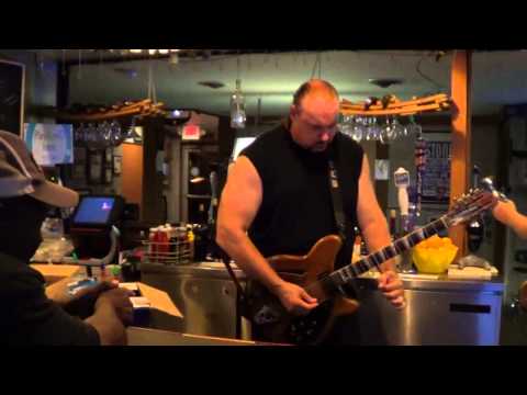 Bluesman Tom Larsen stars in "Knife vs. Guitar"