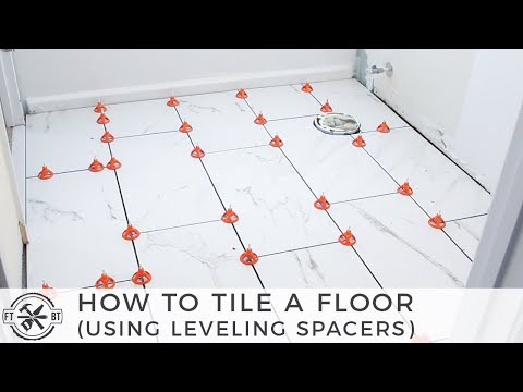 image-How much does it cost to lay bathroom tiles?