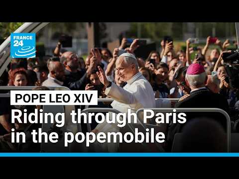 Pope Leo XIV rides through Paris in the popemobile to Notre-Dame
