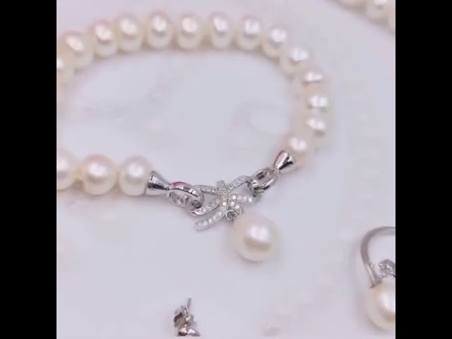 طقم لؤلؤ زراعي وفضة فخم