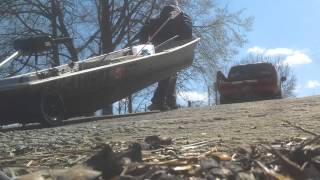 preview picture of video 'jon boat with mounted wheels, my gear, a 3lb 5oz largemouth bass, and loading my  jon boat'