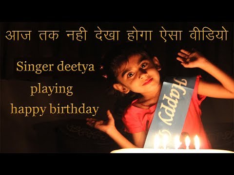 cute singer playing happy birthday to you by singer deetya