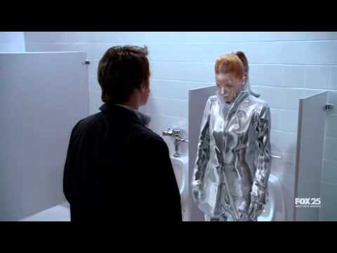 Terminator Shirley Manson morphs out of a urinal !