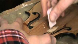Soundpost repair and a fake Stefano Scarampella label / old violin