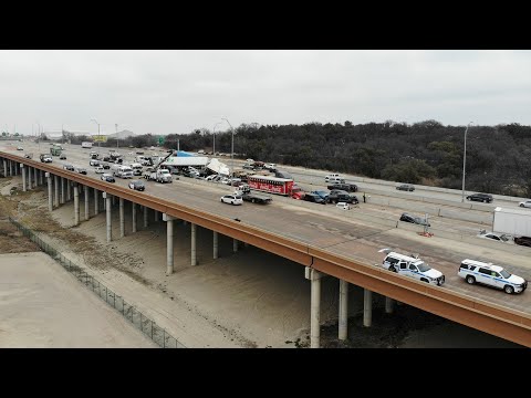 Drone footage shows cleanup effort to remove dozens of vehicles involved in massive pile-up