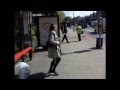 Street drinker doing striptease in public ! London uk ...
