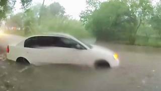 Cops Rescue Baby From Car Swept Up In Floodwater During Storm