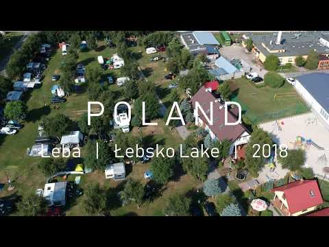 Drone view over Camping Lesny 51 and Lebsko Lake in Leba, Poland