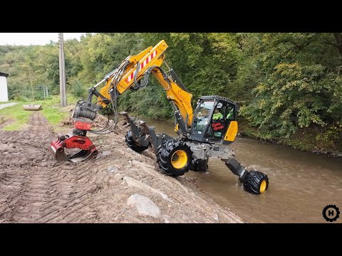 Kaiser walking excavator during flood channel repair