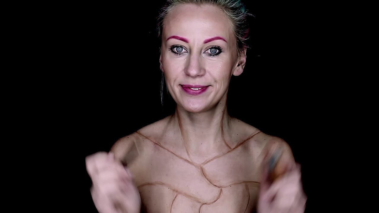 body painting this artists turns herself into a human braid by kika studio