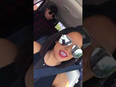 Becky G listering to 'Bumbum Granada'