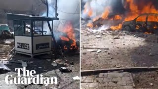 Vehicles burn in Tehran after US-Israeli strikes