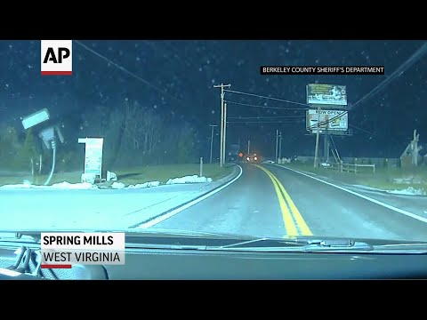 Prosecutor in West Virginia releases police dashcam video showing teenager being beaten by officers and punched during a November traffic stop. (March 21)