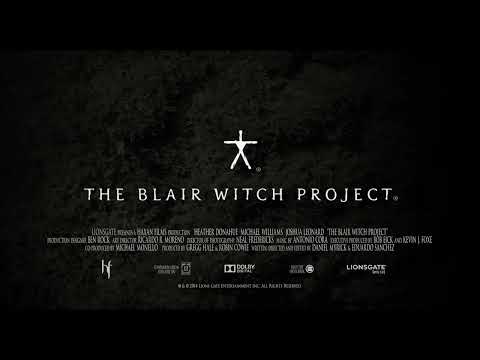 Wide trailer shot: leaf-strewn forest floor, daylight that still feels hostile