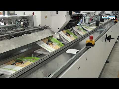 Broschüren mit eingeklebter CD versandfertig in Schrumpffolie