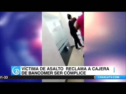 Víctima de asalto reclama a cajera de banco por ser presunta cómplice de delincuentes