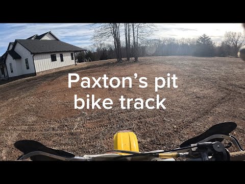 Jace riding Paxton’s pit bike track 3 laps of little jumps