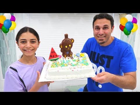 Heidi and Dad showcase teamwork by making a Birthday Cake