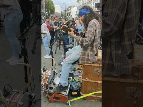 An amazing artist Cam Cole brings the stage to the streets of London - Camden Town.