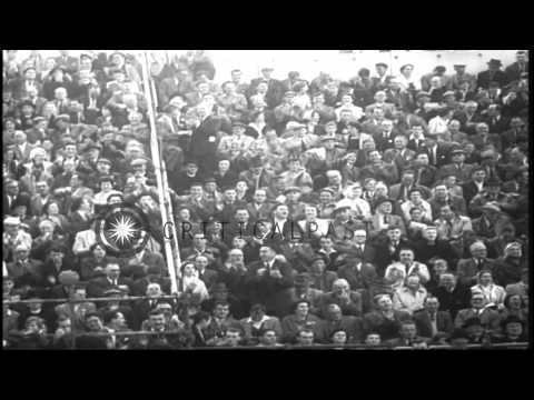 Herb Elliot wins a mile race in a record time in Dublin, Ireland. HD Stock Footage