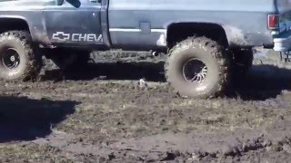 Mud Kings Ont. Lifted 4x4 trucks Mudding, Moms Chevy Impala in the mud hole
