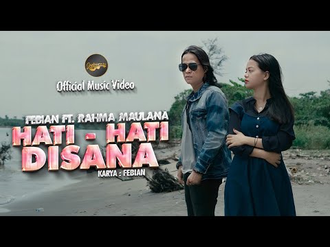 Febian Ft. Rahma Maulana - Hati - Hati Disana (Official Music Video)