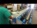 The Accu-Cut Q-7 model rolling up synthetic grass