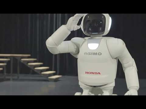 Asimo robot runs, hops and uses sign language