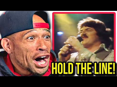 Rapper FIRST time REACTION to Toto - Hold The Line (Official Video)!!
