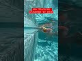 DAD TEACHING HIS DAUGHTER TO SWIM
