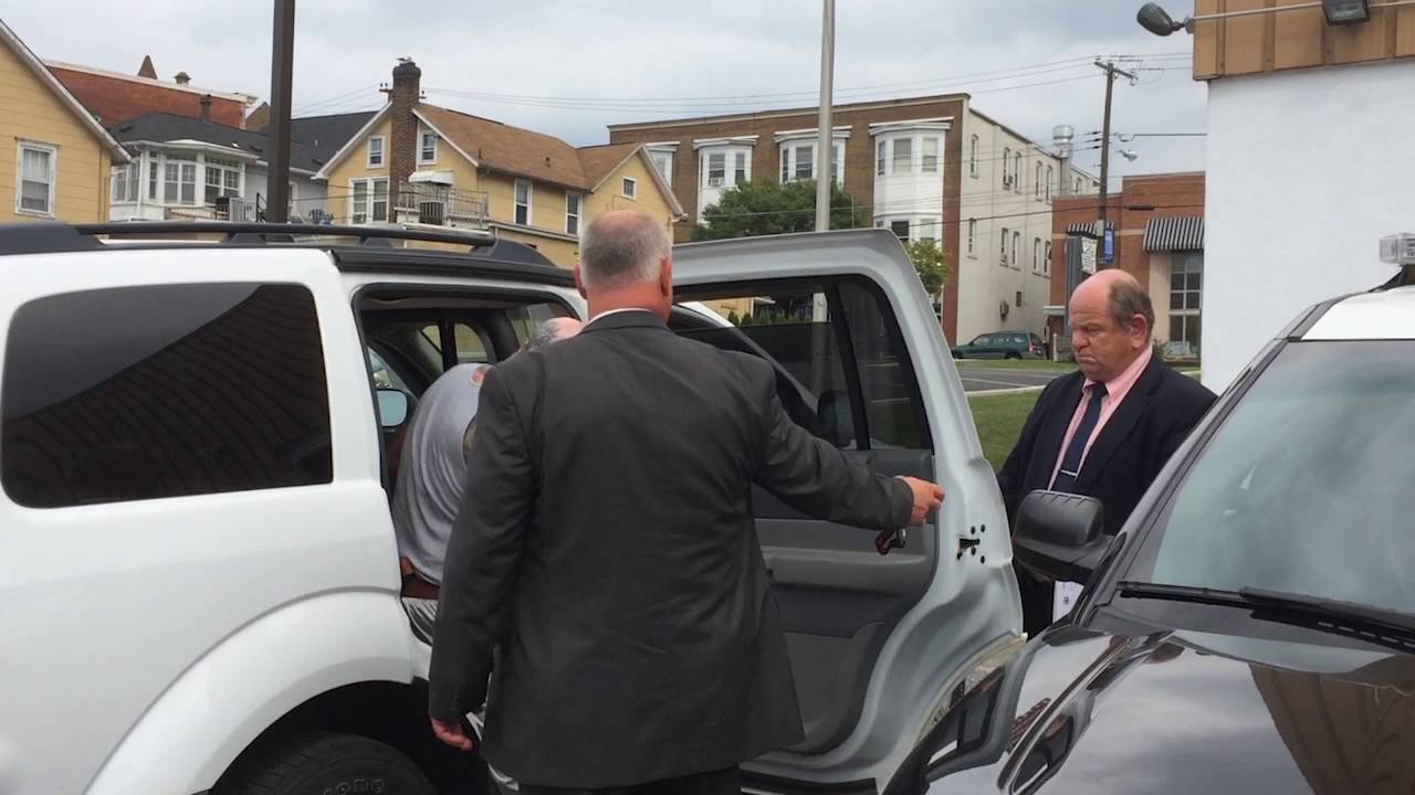 William F. Andrews Jr. leaves arraignment at district court