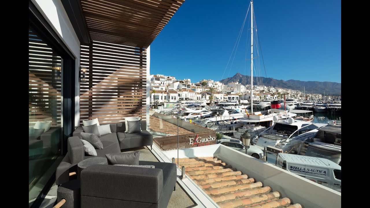 Breathtaking upgraded apartment with post-card perfect views for sale in Puerto Banus, Marbella