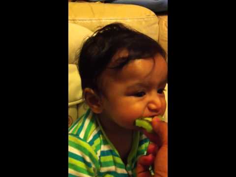 Shanay eating kiwi fruit